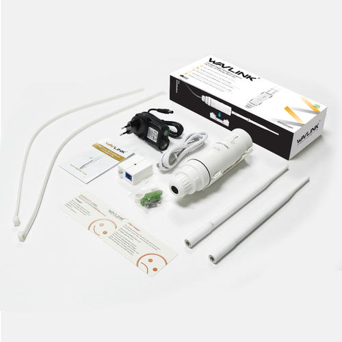 Wavlink outdoor extender box contents: the unit, PoE injector, antennas, mounting strap and manual